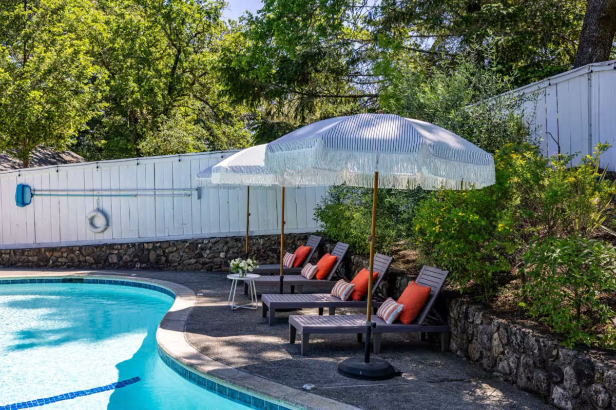 Pool area with lounge chairs
